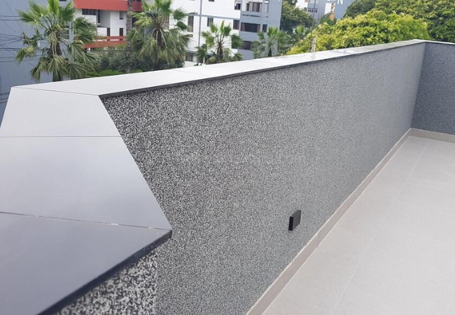 acabado de graniplast en parapeto